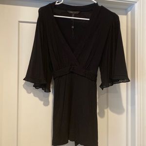 Black tie back BCBG top with fun details